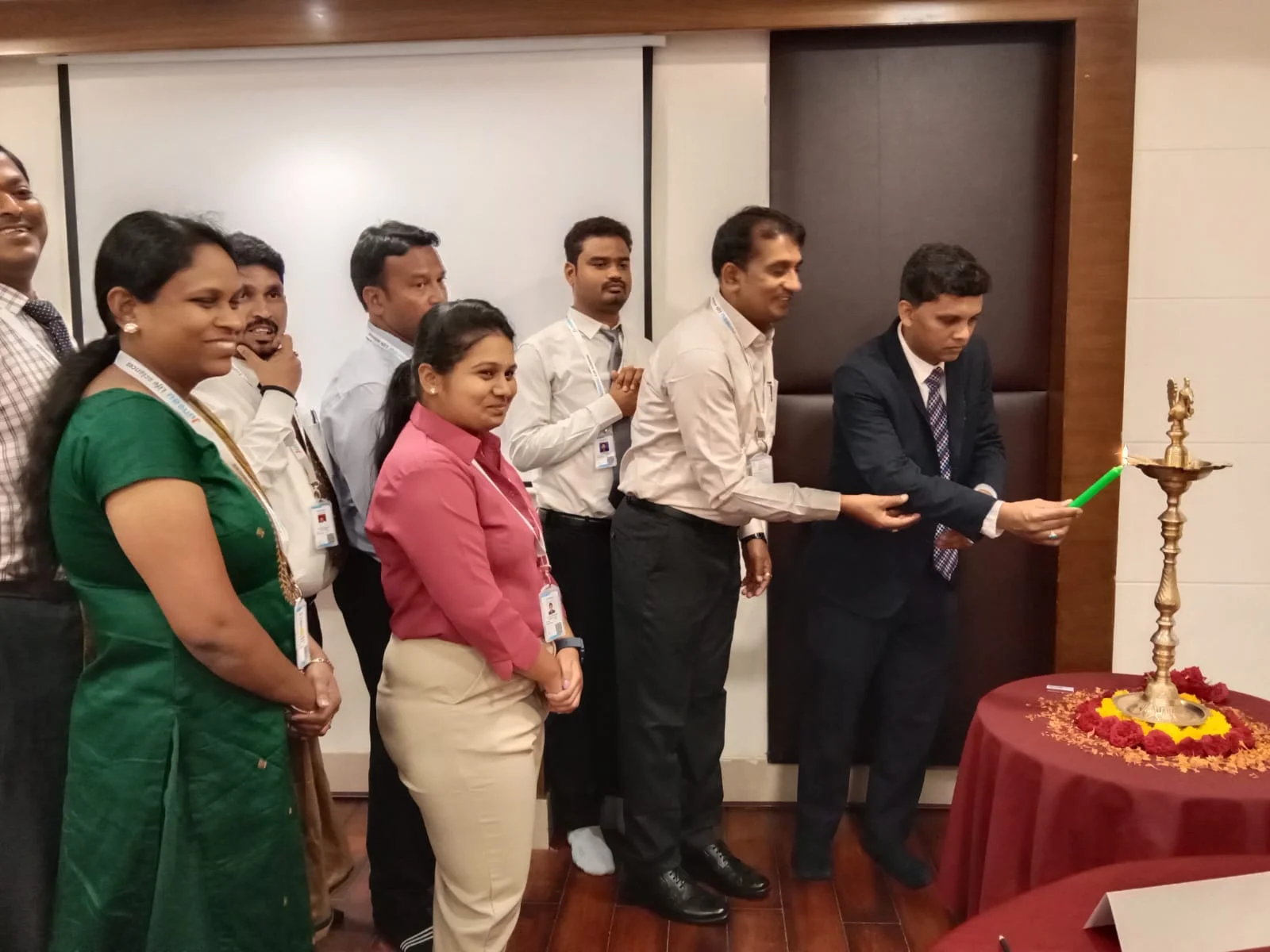 " Dr. Sufi Roomi illuminates the Annual Budget Meeting with a symbolic candle lighting ceremony, marking a journey towards financial clarity and prosperity for all. "